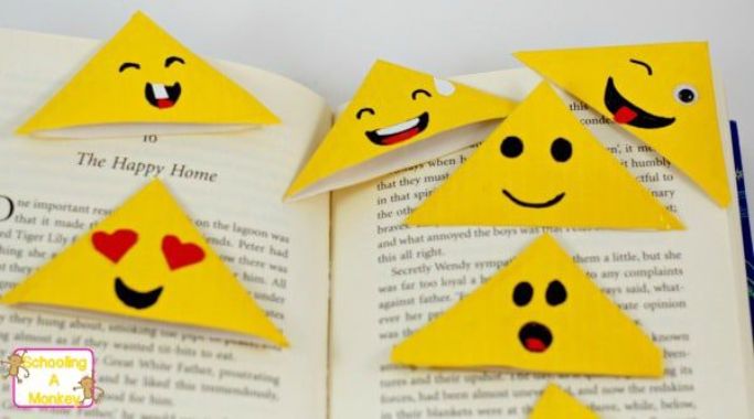 emoji bookmarks made with yellow duct tape