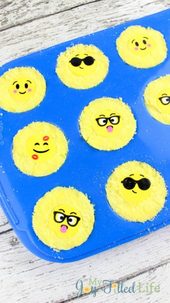 yellow bath bombs with emoji faces