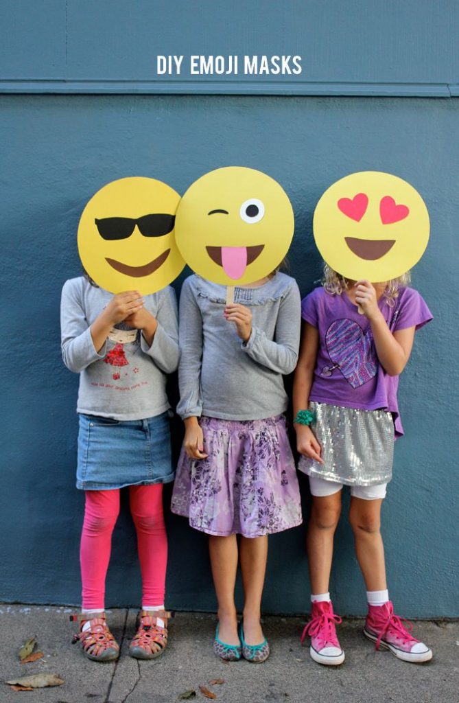 emoji masks made with yellow poster board