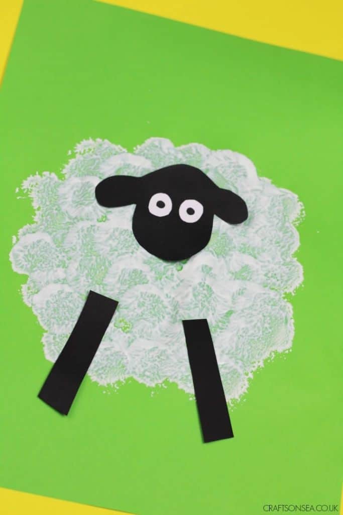 easy toddler sheep craft on green background